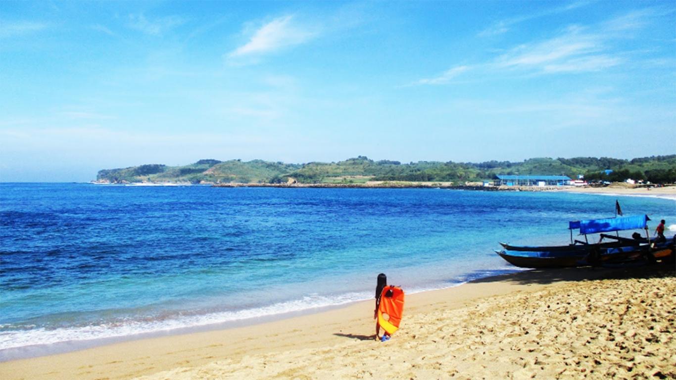 contoh teks deskripsi tentang pantai singkat