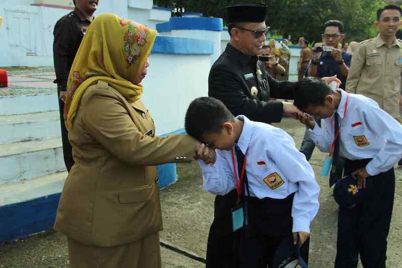 Contoh norma hukum di sekolah